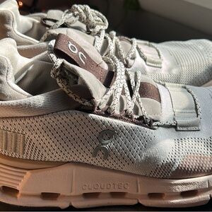 On Running Light Gray and Pink Athletic Shoes